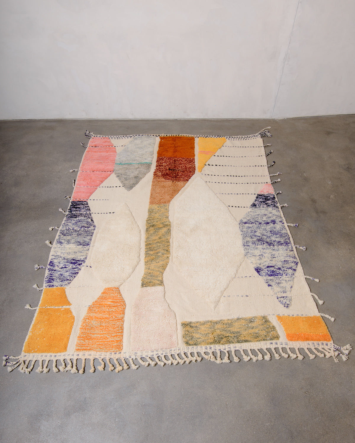 Modern, designer, handcrafted Berber rug from Morocco. Beniourain carpet with beautiful colours and patterns and fluffy wool texture.